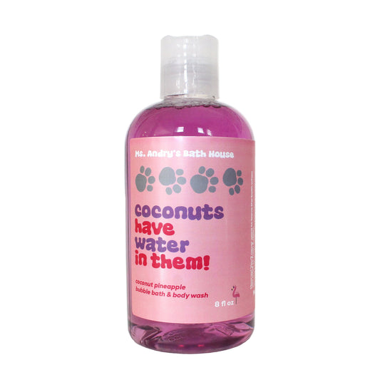 Pink bottle of pet bubble bath and body wash with text on a white background